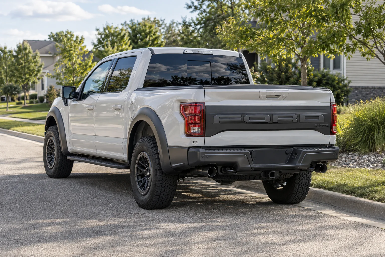 White pickup truck with dark tinted rear glass