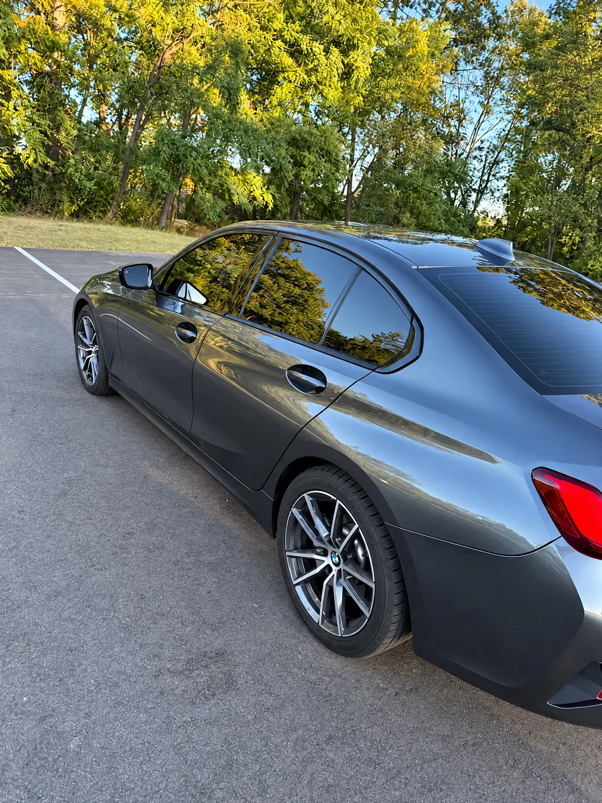 Gray BMW 3 Series with tinted windows