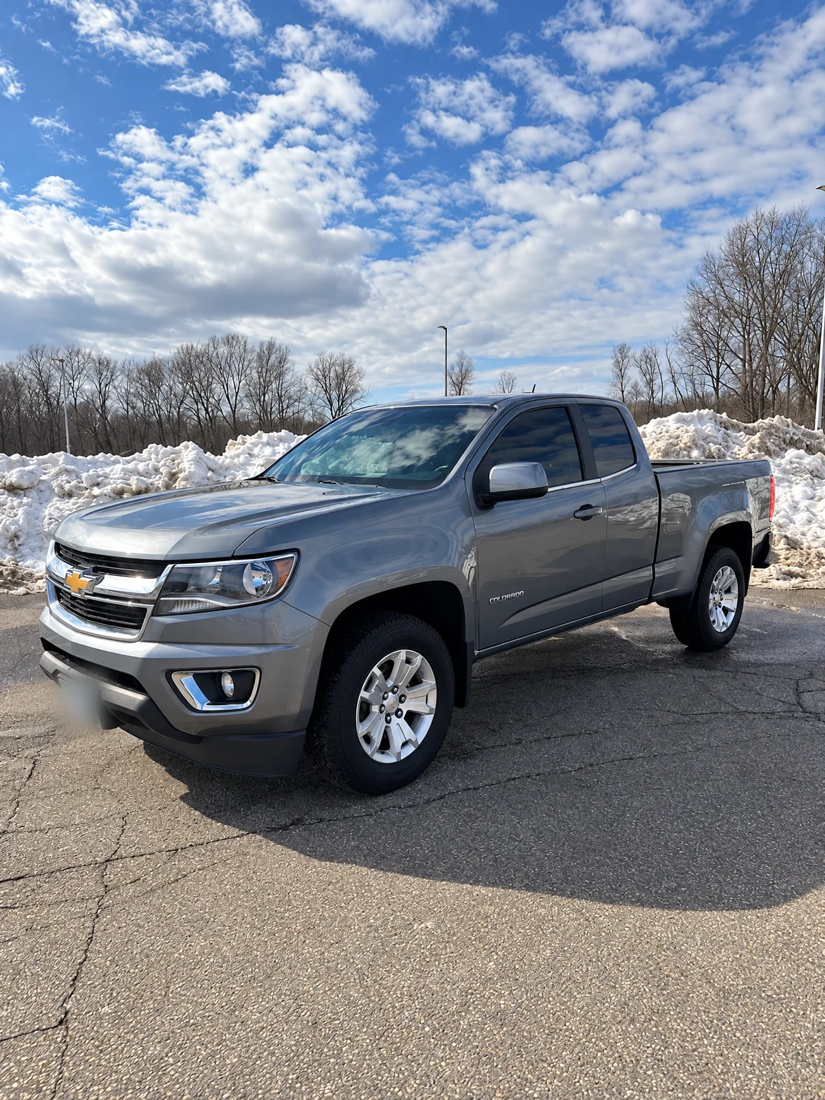 Gray Chevrolet Colorado with tinted windows