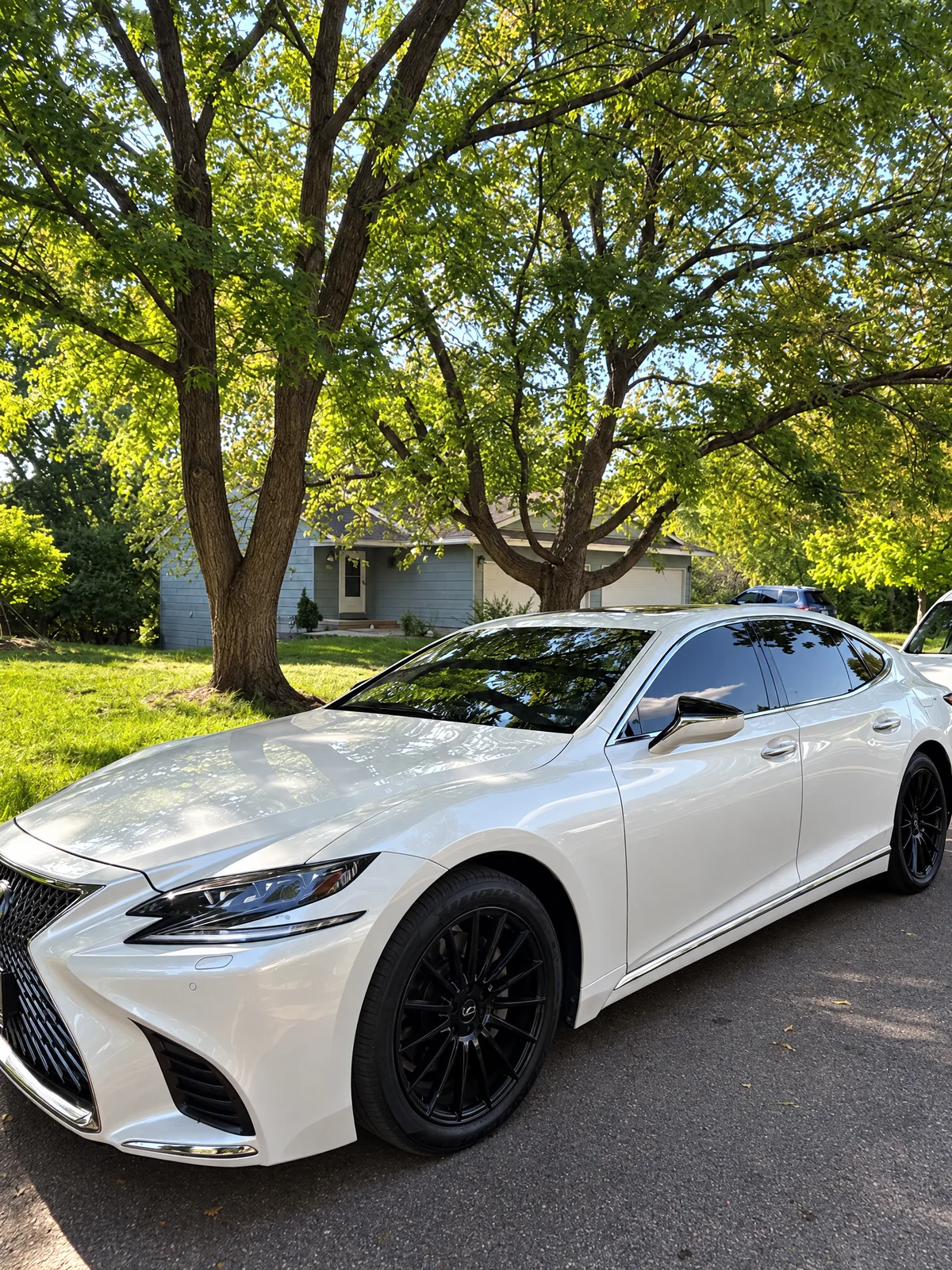 Silver Lexus LS with tinted windows