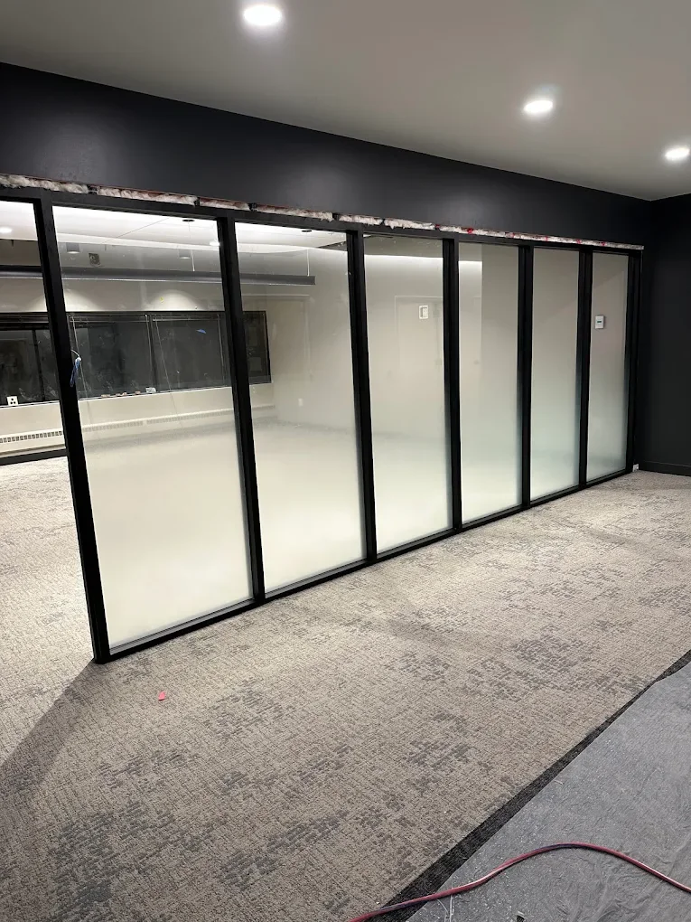 Office glass partition with frosted privacy film