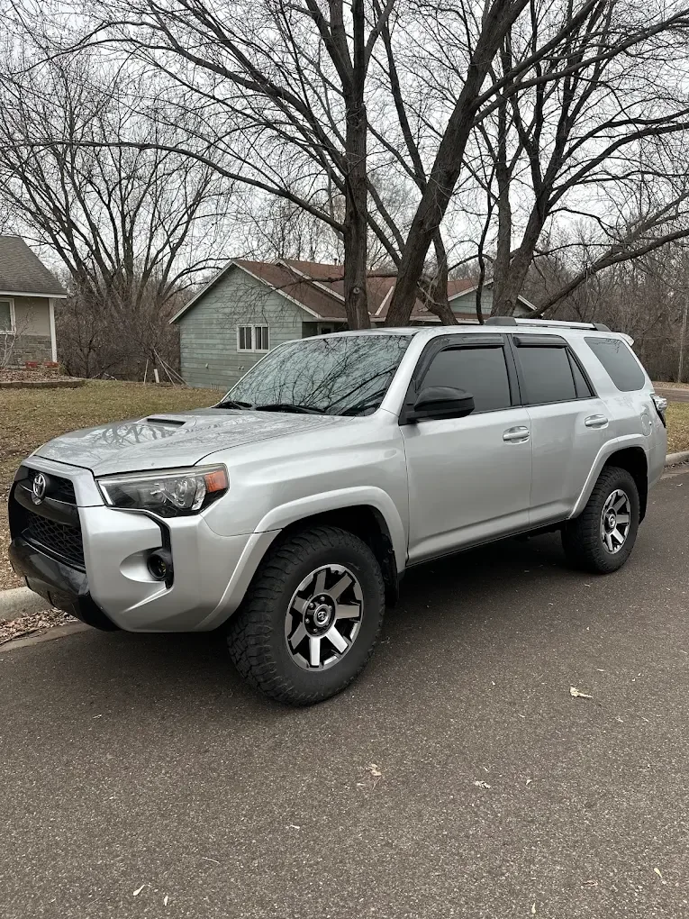 Silver Toyota 4Runner with tinted windows